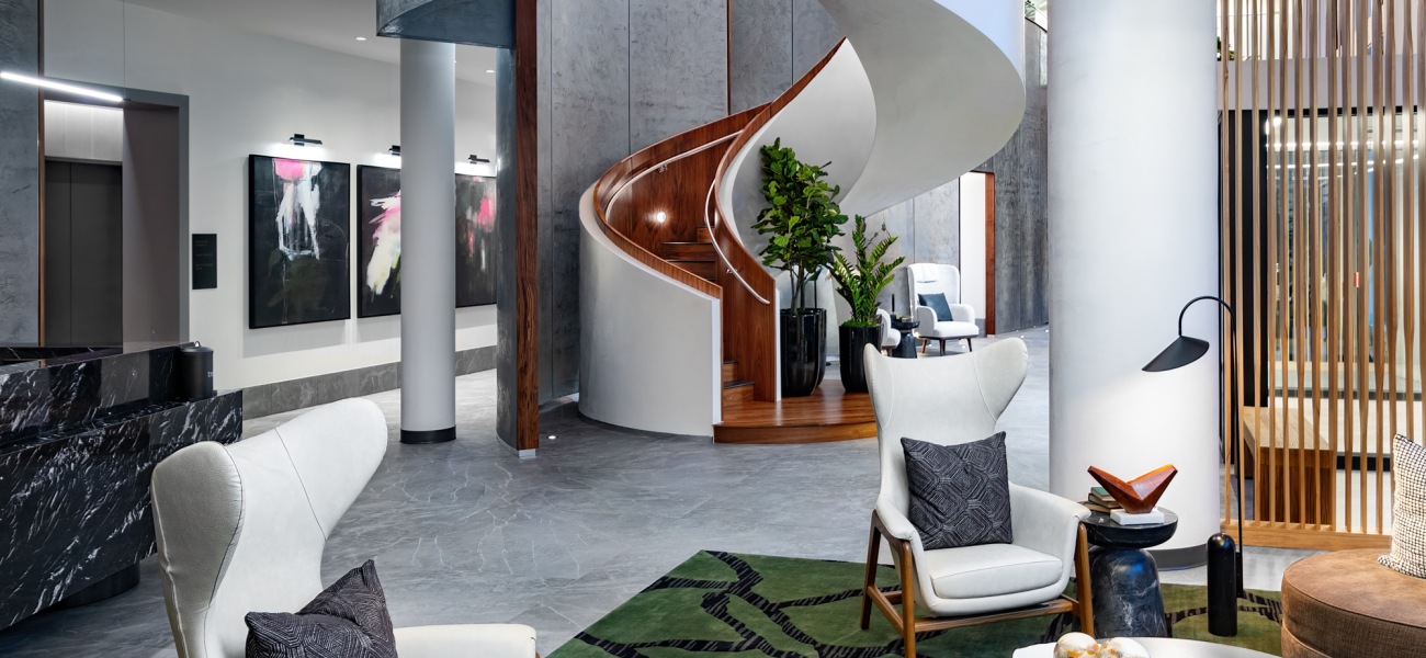 nomia midtown lobby reception spiral staircase seating concierge desk nomia midtown lobby reception spiral staircase seating concierge desk