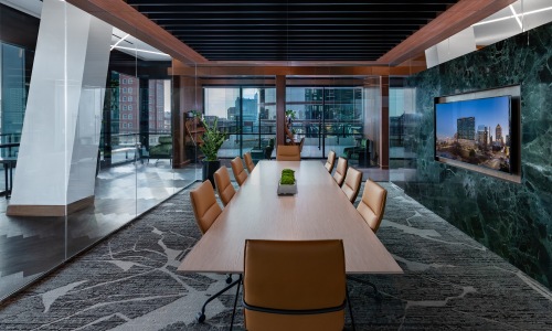 nomia midtown conference room large table chairs window walls tv