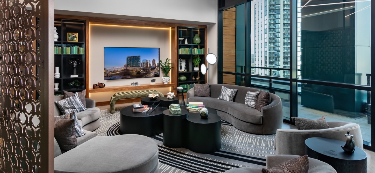 nomia midtown media lounge TV seating sofas large windows nomia midtown media lounge TV seating sofas large windows